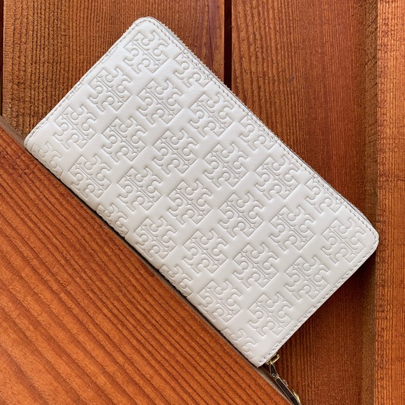 Tory Burch Handbags - Tory Burch embossed T logo pale pink zip up wallet